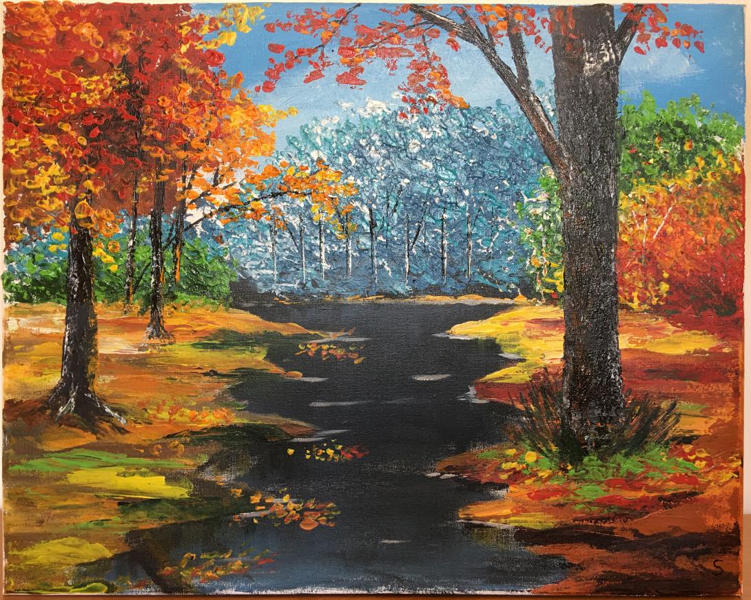 Fiume nel bosco d'autunno