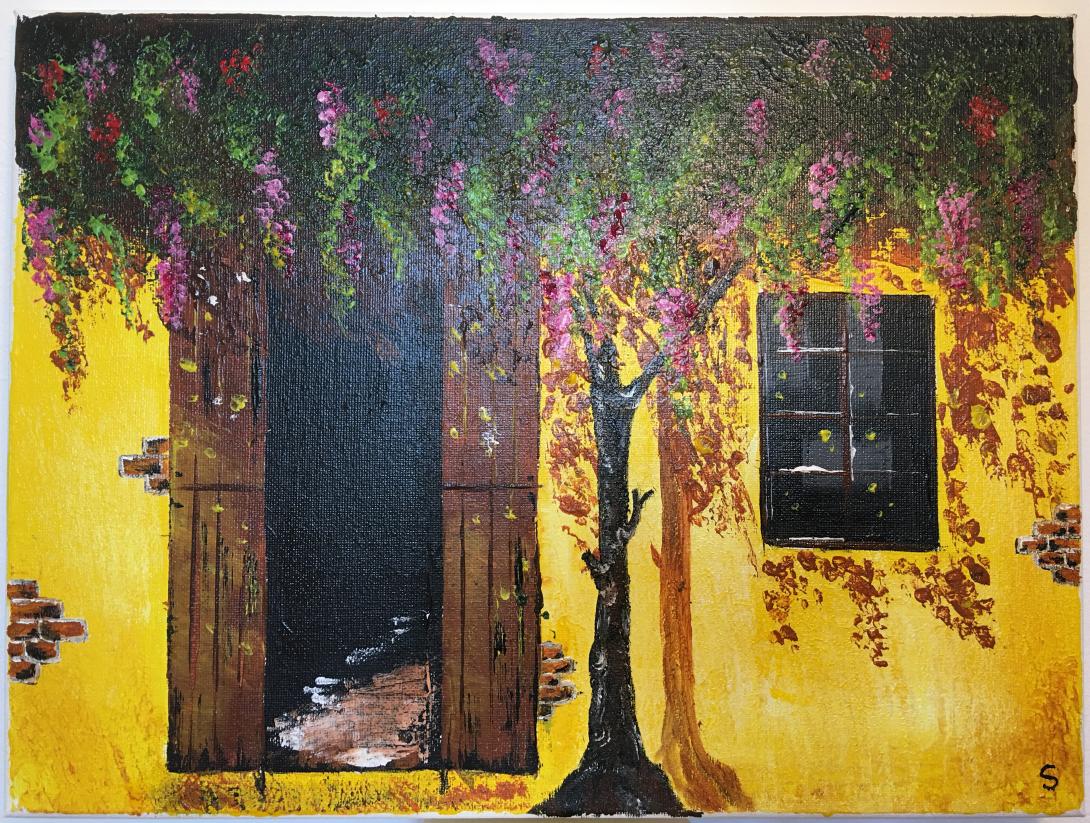 Casa di campagna con glicine