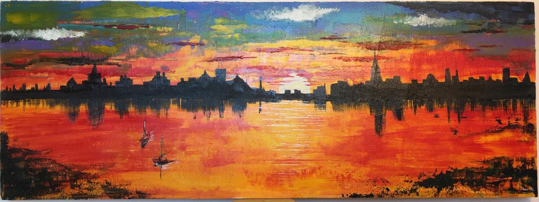 Riflesso di città al tramonto